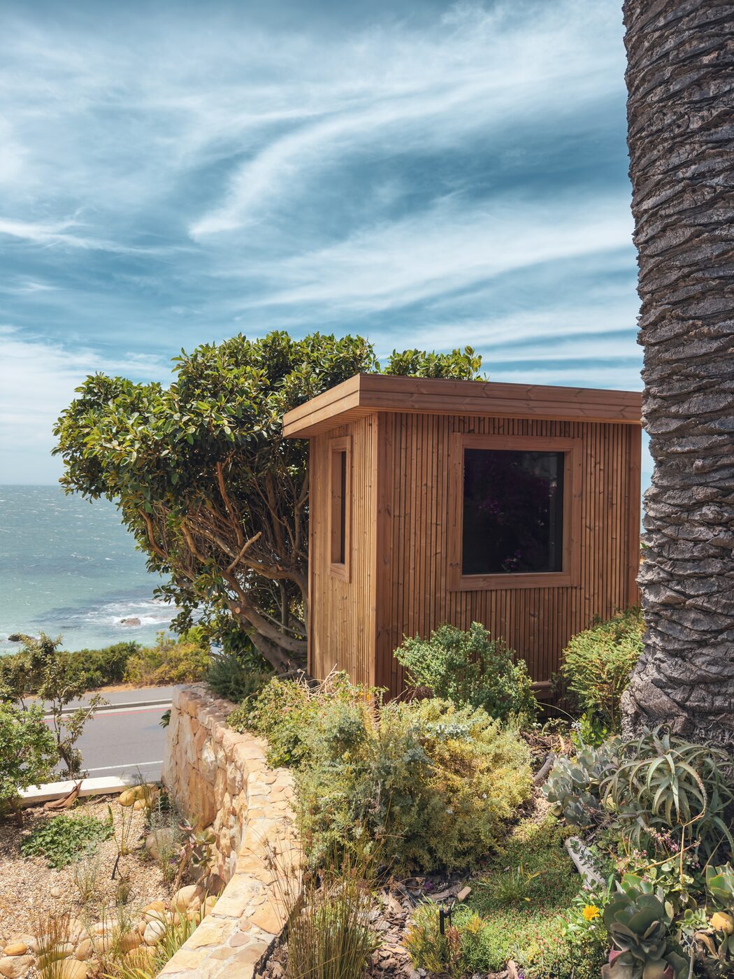 The outdoor sauna above the sea